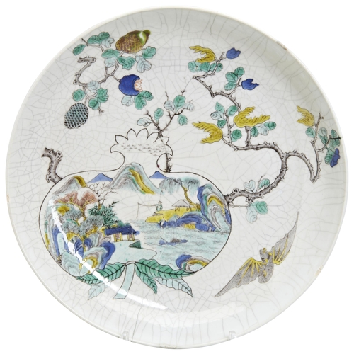 142 - CHINESE POLYCHROME PORCELAIN DISH19TH CENTURY porcelain dish with crackle glaze with enamel, depict ... 