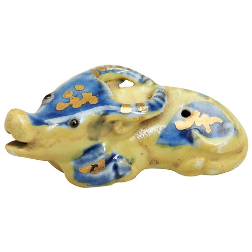 145 - AN UNDER-GLAZE BLUE AND YELLOW GROUND WATER DROPPERQING DYNASTY (1644-1911)in the form of a water bu... 