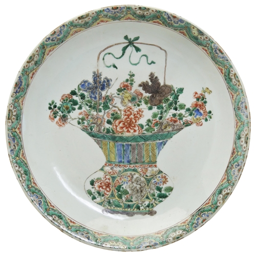 118 - A LARGE FAMILLE VERTE DISHKANGXI PERIOD (1662-1722)centrally decorated with a flowering vase 34.5cm ... 