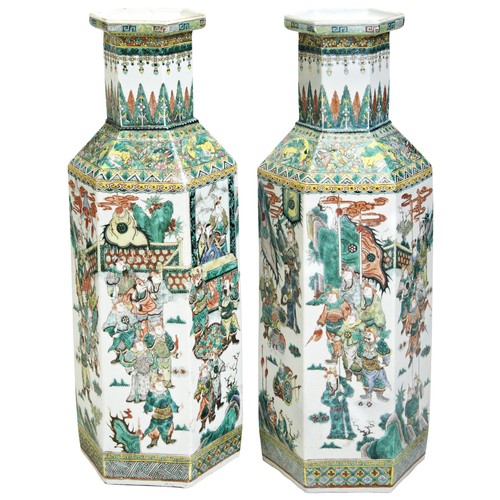 111 - A LARGE PAIR  FAMILLE VERTE HEXAGONAL VASESQING DYNASTY, 19TH CENTURYthe sides decorated with scenes... 