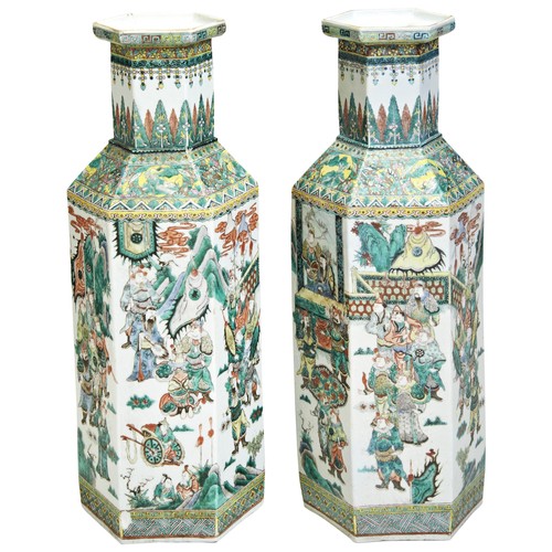 111 - A LARGE PAIR  FAMILLE VERTE HEXAGONAL VASESQING DYNASTY, 19TH CENTURYthe sides decorated with scenes... 