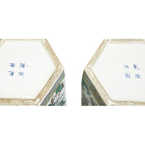 111 - A LARGE PAIR  FAMILLE VERTE HEXAGONAL VASESQING DYNASTY, 19TH CENTURYthe sides decorated with scenes... 