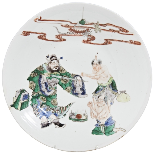 127 - A LARGE FAMILLE VERTE DISHQING DYNASTY, 19TH CENTURYdepicting the taoist immortal Zhong Kui catching... 