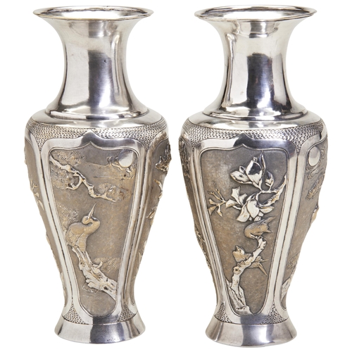 314 - A PAIR OF CHINESE SILVERED-METAL VASESLATE QING DYNASTYof baluster form, the sides decorated in reli... 