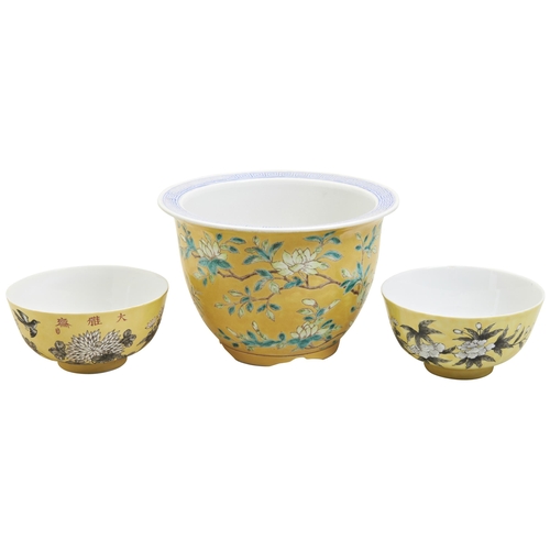 213 - A PAIR OF FAMILLE ROSE YELLOW GROUND BOWL AND A JARDINIERE 19TH/20TH CENTURY two yellow ground bowl ... 