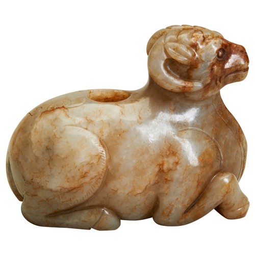 287 - A CARVED JADE FIGURE OF RAM20TH CENTURY a greenish-yellow jade figure of a recumbent ram, probably a... 