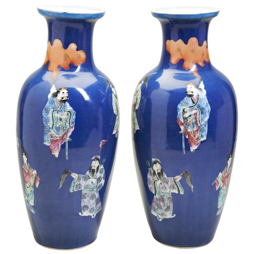 200 - A GOOD PAIR OF POWDER-BLUE-GROUND FAMILLE ROSE 'IMMORTALS' VASESQING DYNASTY, 19TH CENTURY清 十九世纪 洒蓝八... 