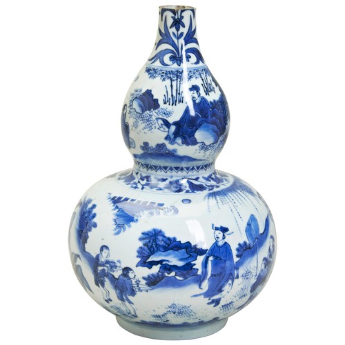 84 - A BLUE AND WHITE DOUBLE-GOURD VASETRANSITIONAL PERIOD, CIRCA 1640明末清初 青花 ‘加官进爵’ 葫芦瓶the sides finely ... 