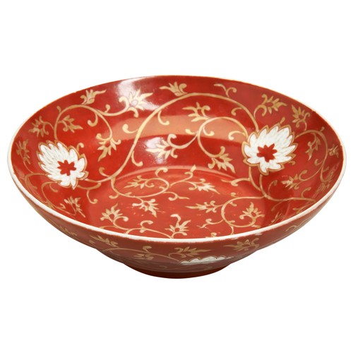 206 - A SMALL CORAL-RED 'LOTUS' DISHLATE QING DYNASTYdecorated with lotus blossoms and scrolling tendrils,... 