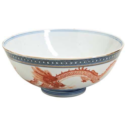 207 - AN UNDERGLAZE BLUE AND COPPER-RED 'DRAGON' BOWLLATE QING DYNASTYwith an apocryphal Qianlong six char... 