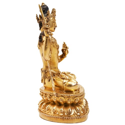 14 - A FINE GILT BRONZE FIGURE OF MANJUSHRIYONGLE SIX CHARACTER MARK AND PROBABLY OF THE PERIOD 明 铜鎏金文殊造像... 