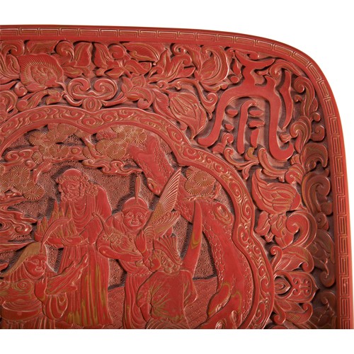 374 - A FINE CINNABAR LACQUER DISHQIANLONG PERIOD (1736-1795) 清 剔红方形漆盘red square carved lacquer dish depic... 