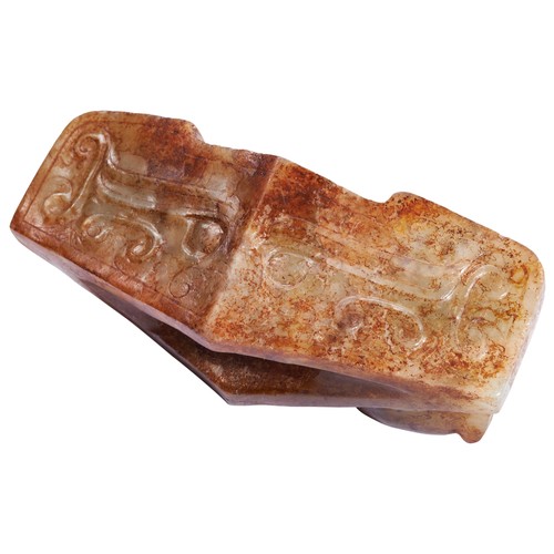 299A - AN ARCHAISTIC RUSSET JADE PENDANTMING / QING DYNASTYcarved with a chilong and taotie mask5.5cm wide... 