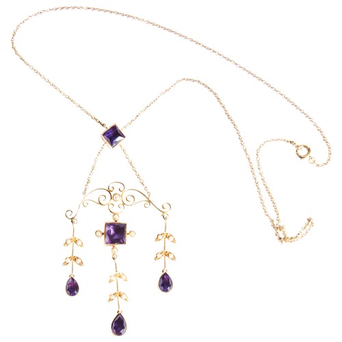 242 - AN AMETHYST AND SEED PEARL PENDANT, CIRCA 1890the square-cut amethyst millegrain collet set suspendi... 