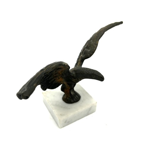 10 - TWO EAGLE CAR MASCOTSTwo brass car mascots in the form of an Eagle, mounted on marble bases. Both c.... 