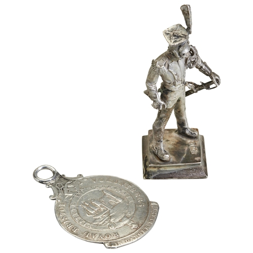 81 - A SILVER MODEL OF A MILITARY OFFICER, SHEFFIELD C.1901. Together with a medallion of the Royal Brist... 