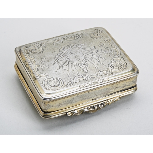 10 - AN OBLONG SILVER GILT BOX WITH A CHASED LID, GERMAN C.1840. The lid embossed and chased with a class... 