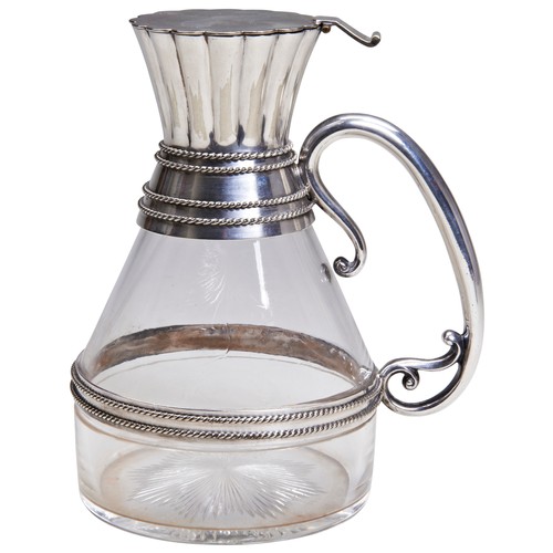 134 - AN ELECTRO-PLATE MOUNTED GLASS CLARET JUG DESIGNED BY DR C. DRESSER, HUKIN & HEATH C.1880. A les... 