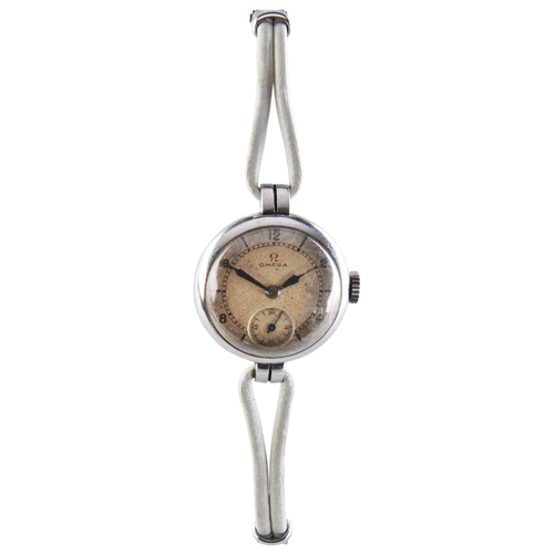 378 - AN 18CT GOLD LADIES WRISTWATCH, signed silvered dial with baton numerals, with Omega flexible bracel... 