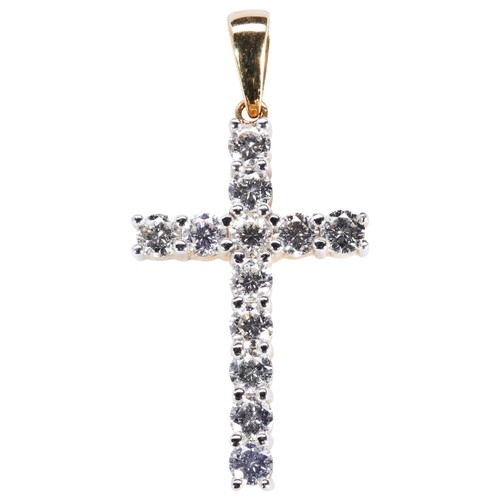 266 - A DIAMOND CROSS PENDANTset with twelve brilliant-cut diamonds on a plain hoop.Hallmarked for 18 cara... 