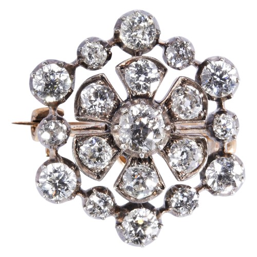 348 - A VICTORIAN DIAMOND CLUSTER BROOCH, CIRCA 1890the old brilliant-cut diamond collet set above two row... 