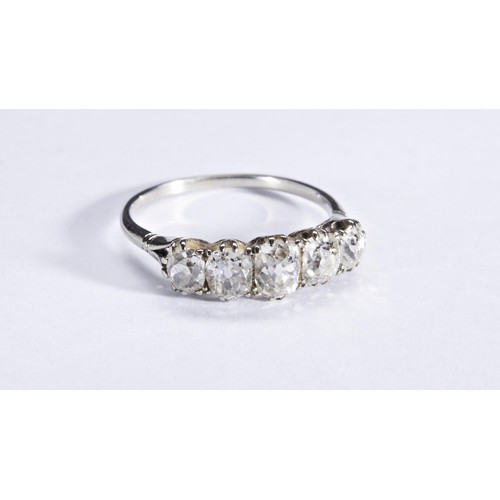 349 - A FIVE STONE DIAMOND RINGthe five graduating cushion-cut diamonds, each claw set, between tapering s... 