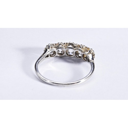 349 - A FIVE STONE DIAMOND RINGthe five graduating cushion-cut diamonds, each claw set, between tapering s... 