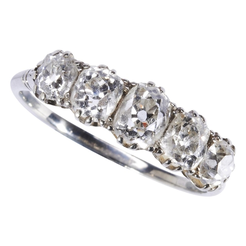 349 - A FIVE STONE DIAMOND RINGthe five graduating cushion-cut diamonds, each claw set, between tapering s... 