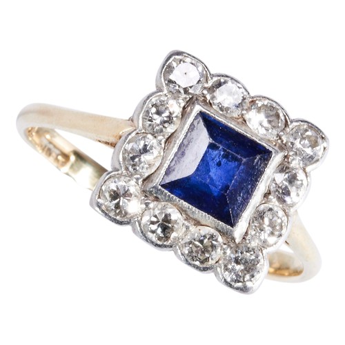 337 - A SAPPHIRE AND DIAMOND PLAQUE RING, CIRCA 1915the square-cut sapphire rubover set within a border of... 