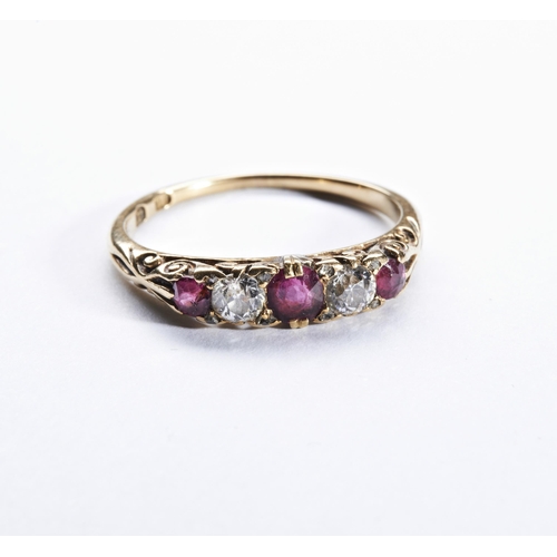 340 - A RUBY AND DIAMOND RING, CIRCA 1900the three circular mixed-cut rubies and two old brilliant-cut dia... 