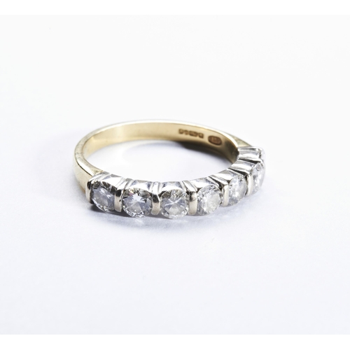 278 - A HALF HOOP DIAMOND ETERNITY RINGthe seven brilliant-cut diamonds set with bar links between, in whi... 