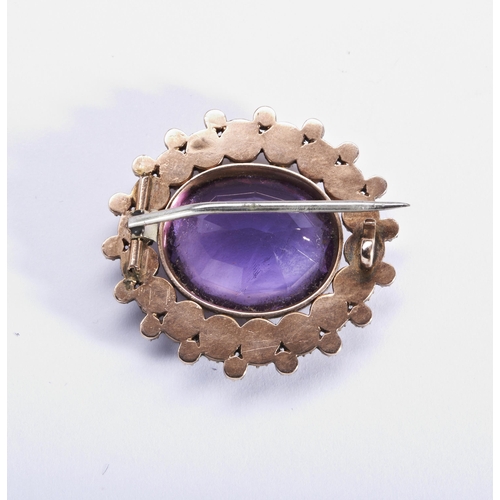 245 - AN AMETHYST AND PEARL BROOCH, CIRCA 1880the oval mixed-cut amethyst collet set within a double borde... 