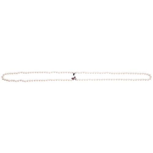 281 - A CULTURED PEARL NECKLACE WITH RUBY AND DIAMOND CLASP the two uniform rows of cultured pearls on a r... 