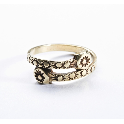 222 - A GOLD RING, CIRCA 1800 of cross over design with flower detail throughout.Total weight 3.9gmsRing s... 