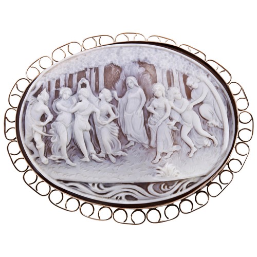 282 - A  SHELL CAMEO BROOCH, CIRCA 1880carved to depict dancing maidens within a woodland scene, within a ... 