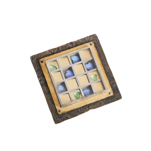 318 - CATHERINE MANNHEIM; AN ABSTRACT SILVER BROOCH the hammered silver square with locket inset with a si... 