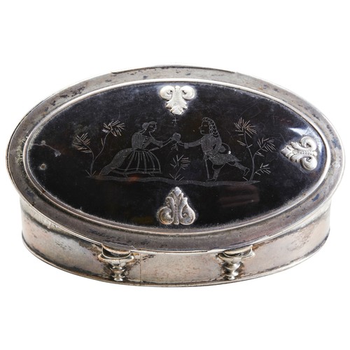 124 - AN OVAL SILVER AND TORTOISE SHELL SNUFF BOX, LONDON C.1730.  Gilt interior with an engraved scene of... 