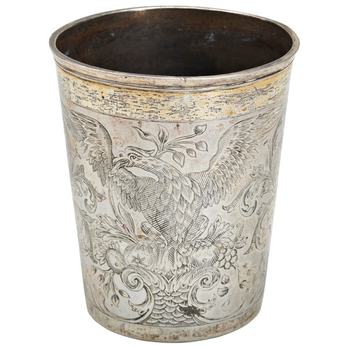 8 - AN ENGRAVED PARCEL GILT BEAKER, MOSCOW C.1760. The body engraved with eagles between fruit, scrolls ... 