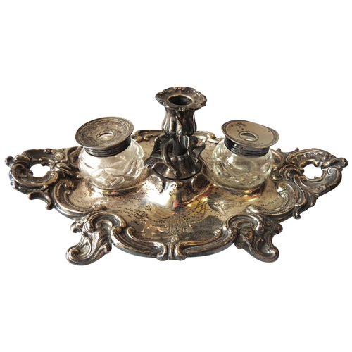 456 - AN EARLY VICTORIAN SILVER INKSTAND, the oval form stand with ornate chased rocaille decoration to th... 