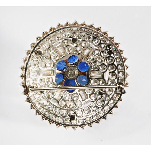 342 - SAPPHIRE AND DIAMOND BROOCH, CIRCA 1940the domed mount set to the center with a brilliant-cut diamon... 