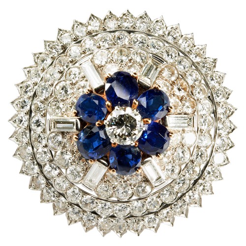 342 - SAPPHIRE AND DIAMOND BROOCH, CIRCA 1940the domed mount set to the center with a brilliant-cut diamon... 