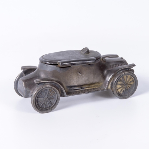 22 - EDWARDIAN MOTORCAR DESK-TIDY ORNAMENT c1914; of silver-plated speltre with Lancia-styled radiator de... 