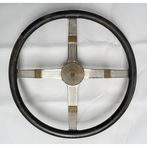 32 - PANHARD-LEVASSOR STEERING-WHEEL c.1920sRare Art-Deco design four-spoke nickel-plated steel with blac... 