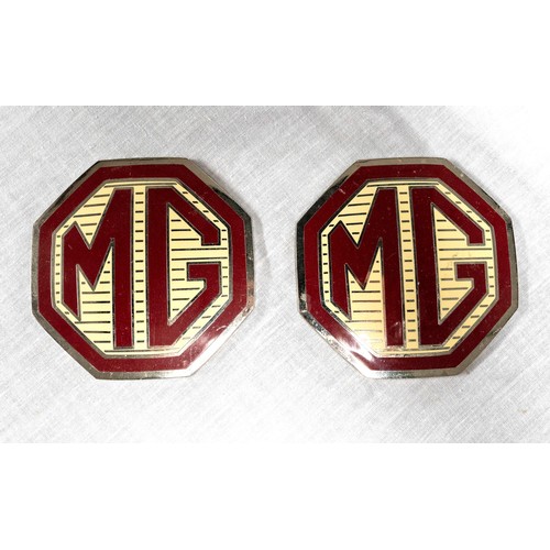 330 - TWO LARGE OCTAGONAL MG BADGESNew/old stock with self-adhesive backing.