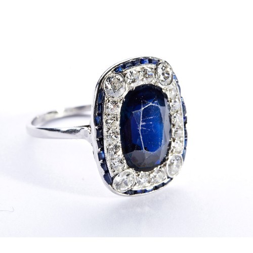 286 - AN ART DECO CUSHION CUT SAPPHIRE AND DIAMOND PLAQUE RING, CIRCA 1930 the cushion-cut sapphire set wi... 