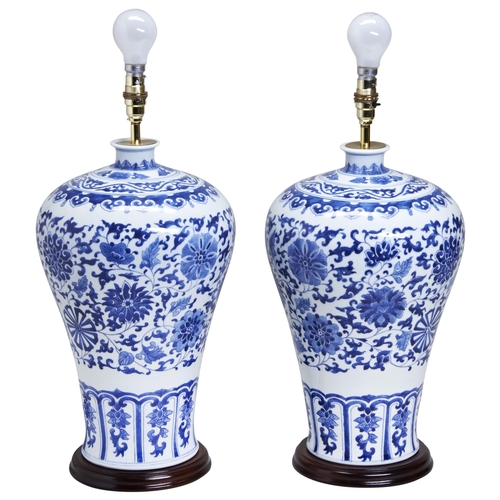 617 - PAIR OF LARGE BLUE AND WHITE VASE SHAPED LAMP BASESProvenance: From The Private Collection of the La... 