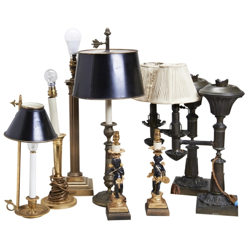 621 - A GROUP OF 8 TABLE LAMPS including a near pair of cherubs, a pillar lamp and others.Provenance: From... 