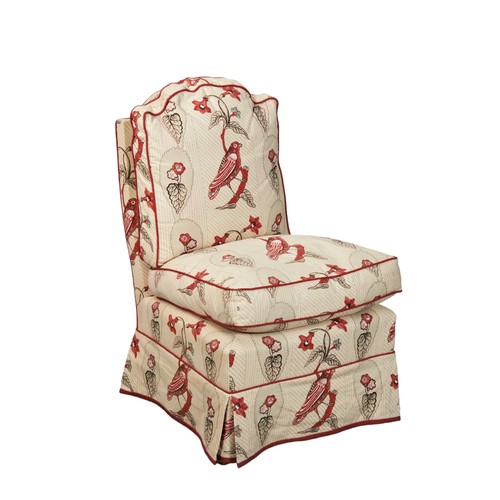 484 - A HOWARD CHAIRS LIMITED UPHOLSTERED BEDROOM CHAIR covered in a cream fabric with repeating red bird ... 