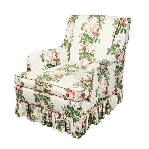 490 - A HOWARD STYLE CHINTZ COVERED ARMCHAIR with tricolor piping85cm x 70cm x 83cm NB: These soft furnish... 