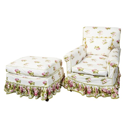 493 - PORTMAN UPHOLSTERY CHINTZ COVERED DEEP SEAT ARMCHAIR AND MATCHING FOOTSTOOL, 20TH CENTURY85cm x 73cm... 